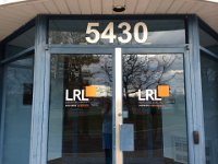 LRL Associates  Cut vinyl logos on exterior doors